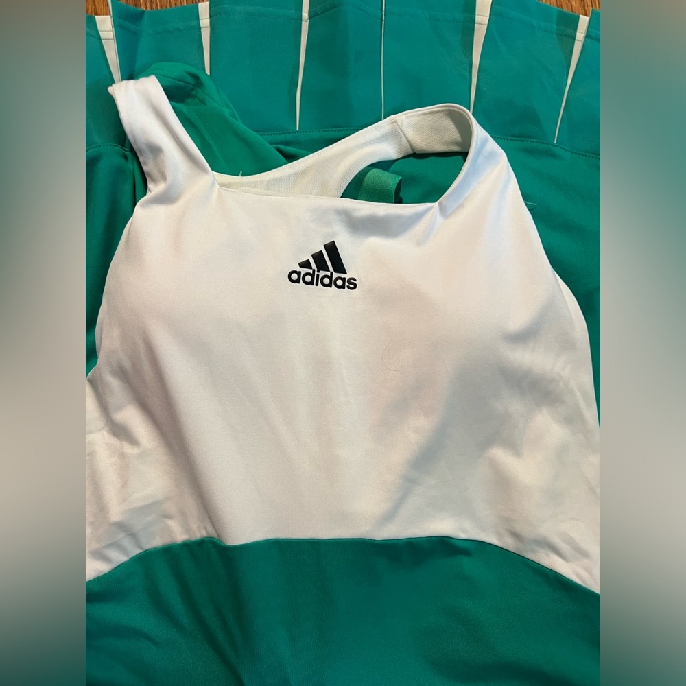 Brand new Adidas tennis dress with shorts.